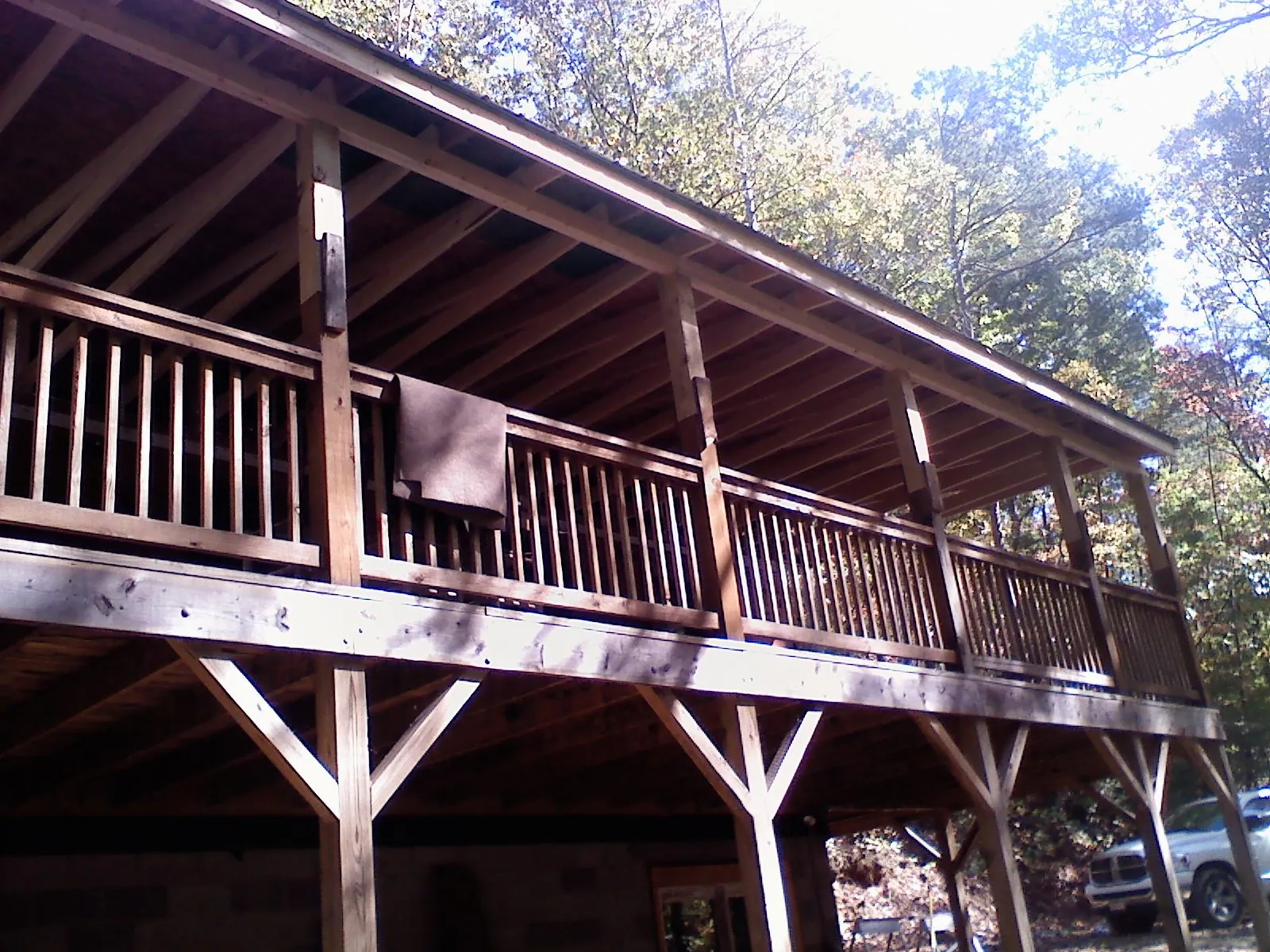 Timber framing under a new elevated porch and deck — Roof Leak Repair in Joint Base Mdl by Roofing Brothers